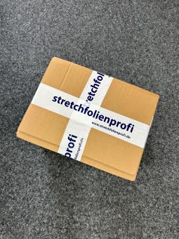 Produktfixierung mit Stretchfolie im Versandkarton 